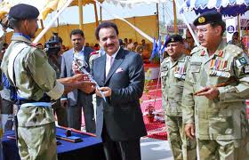A. Rehman Malik Reciving Sword