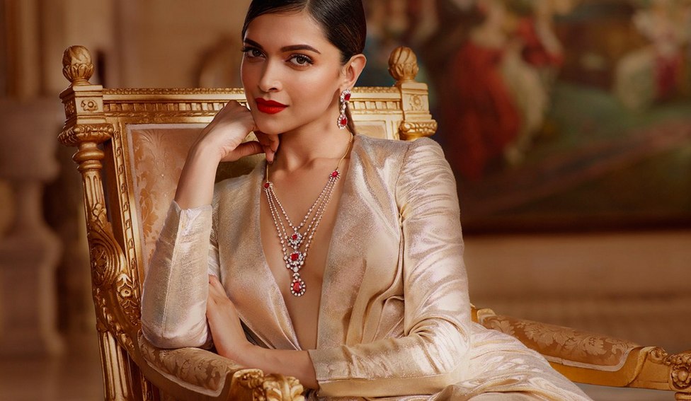 Deepika makes a bold statement in gold with hints of red. (Photo court