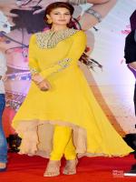 Jacqueline Fernandez. love the pop of yellow and high-low skirt!