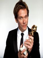 Kevin Bacon receiving award