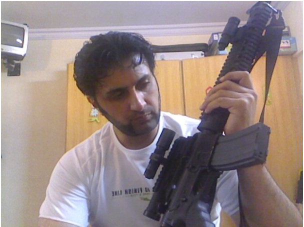 Asad Malik with Gun