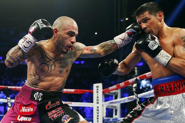Cotto Punching Martinez During Title Fight
