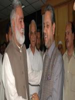 Akram Khan Durrani with party members