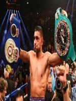 Amir Khan celebrates his victory against Luis Collazo at the MGM Grand