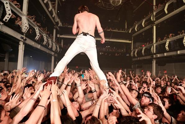 Matt Shultz being supported by fans near the end of the show