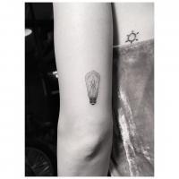 Lucy Hale gets vintage light bulb tattoo