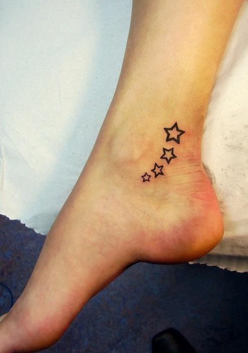 Stars tattoo around ankle- cute but I'm not sure i want another ankle