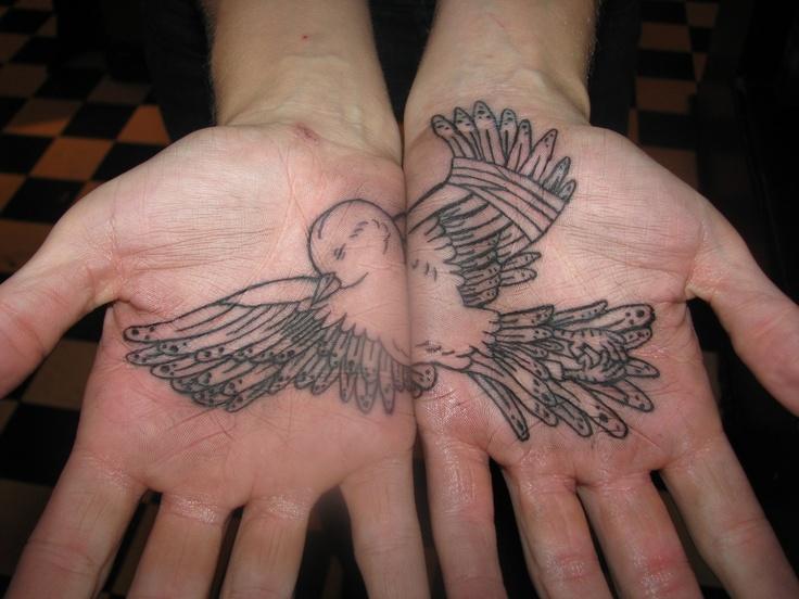 Bird in Hands Tattoos