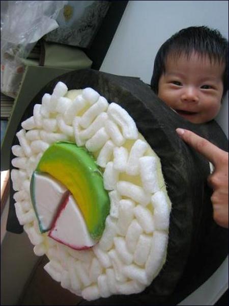 Oh my God, it's an Asian baby in a sushi costume. And he just looks s