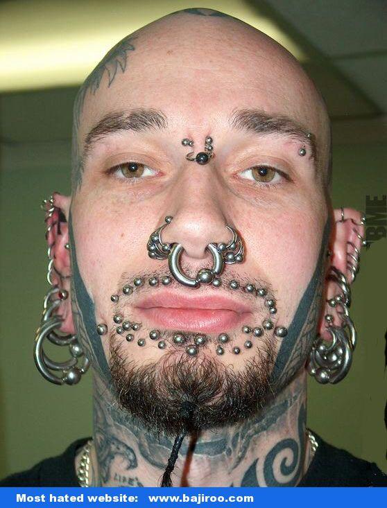 How many Holes are In His Face Count It