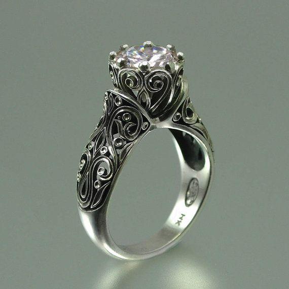 This ring is fantastic! The ENCHANTED PRINCESS Moissanite 14K gold by