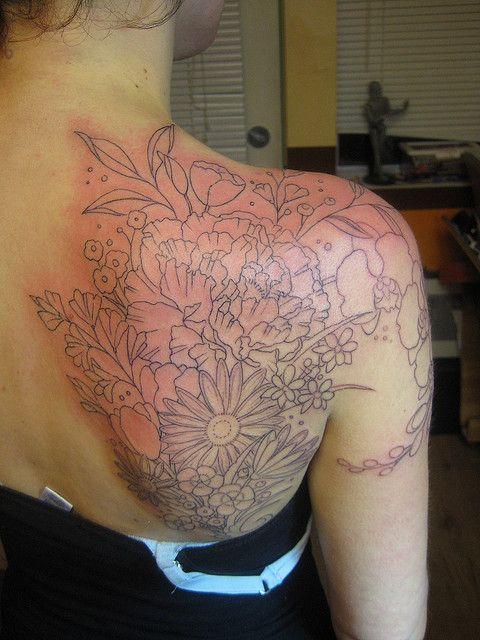 Flower on back tattoos