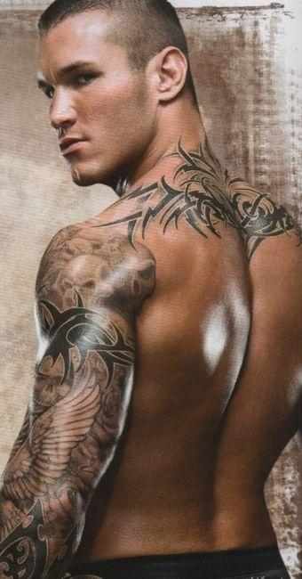 Nothing sexier than a man with tattoos... Good tattoos though lol