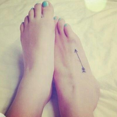 arrow tattoos on foot