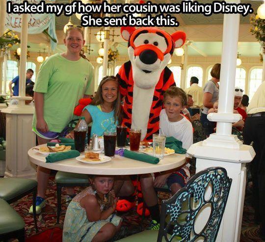 Take notice of the little girl cowering in fear under the table.