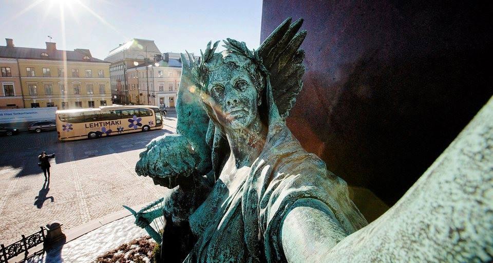 statues in our city taking selfie