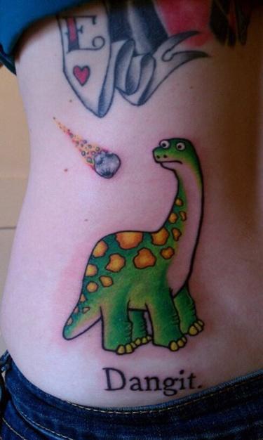 Dinosaur and meteor tattoo. This made me smile.